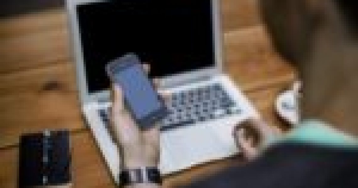 person typing on computer